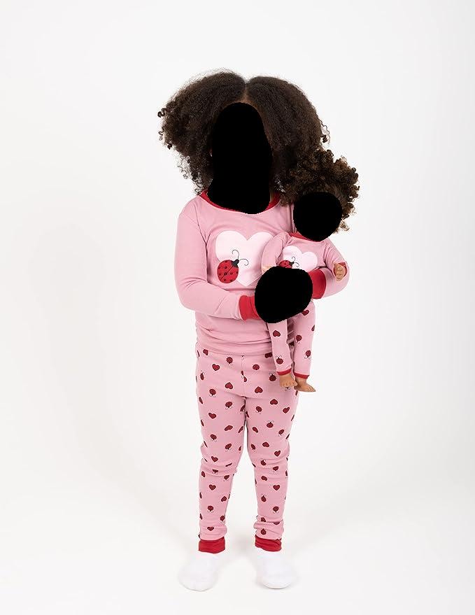 Adorable girls pajamas with matching dolls pajamas.